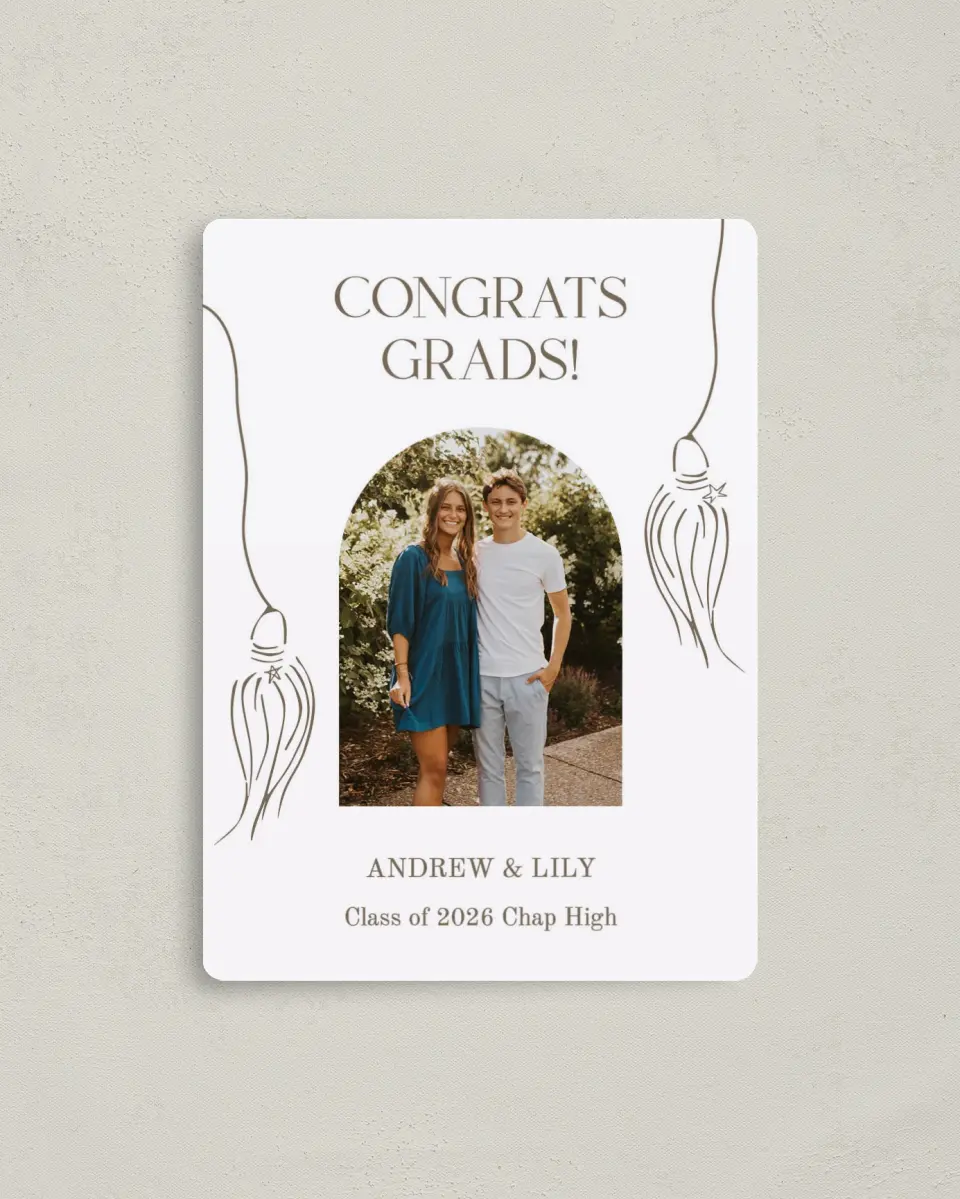 This is a 4" x 5½" Graduation Announcement Magnet called Cap and Gown printed in full color with a Luxe Satin finish