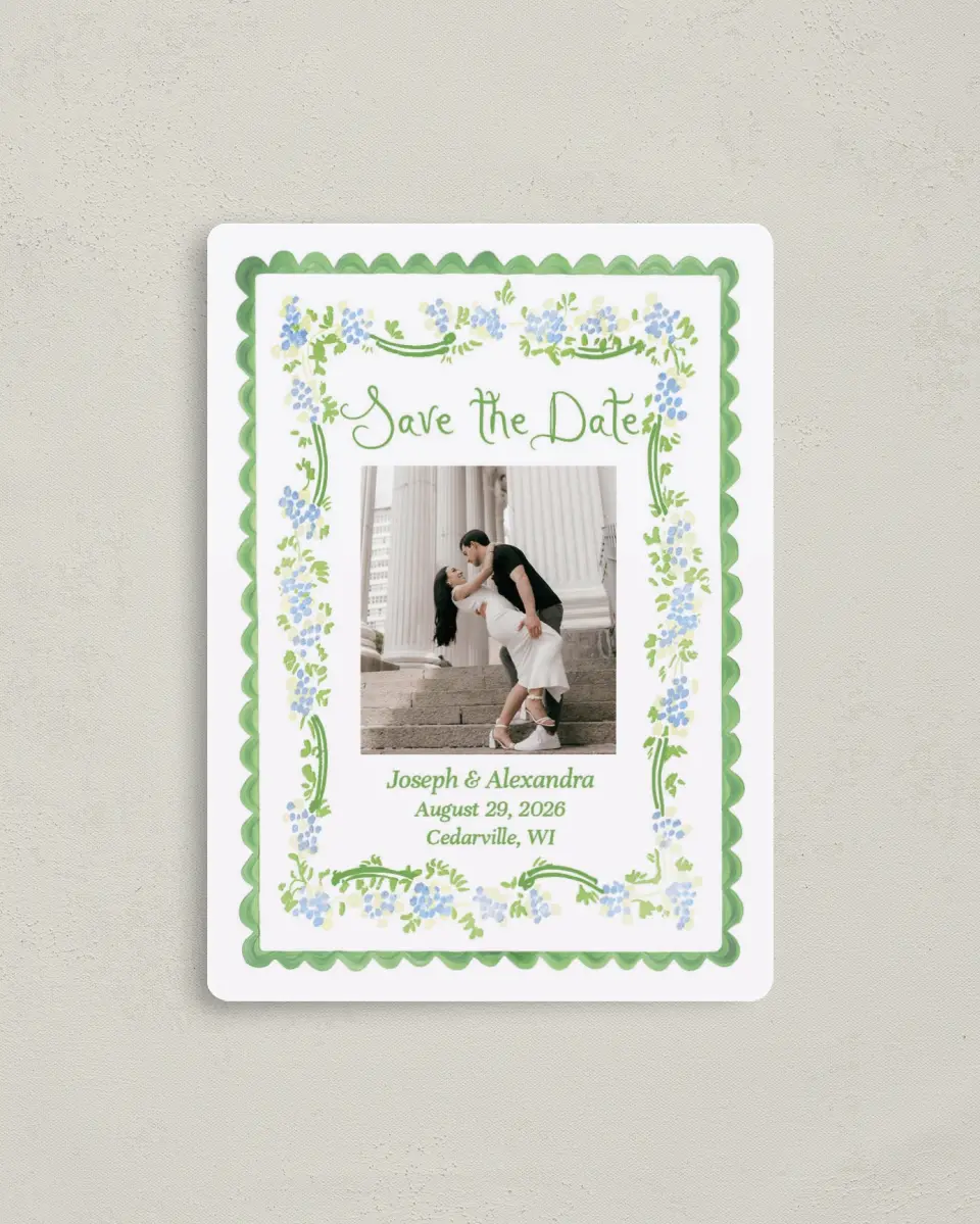 This is a 4" x 5½" Save the Date Magnet called Flower Frame printed in full color with Gold foil and a Luxe Satin finish