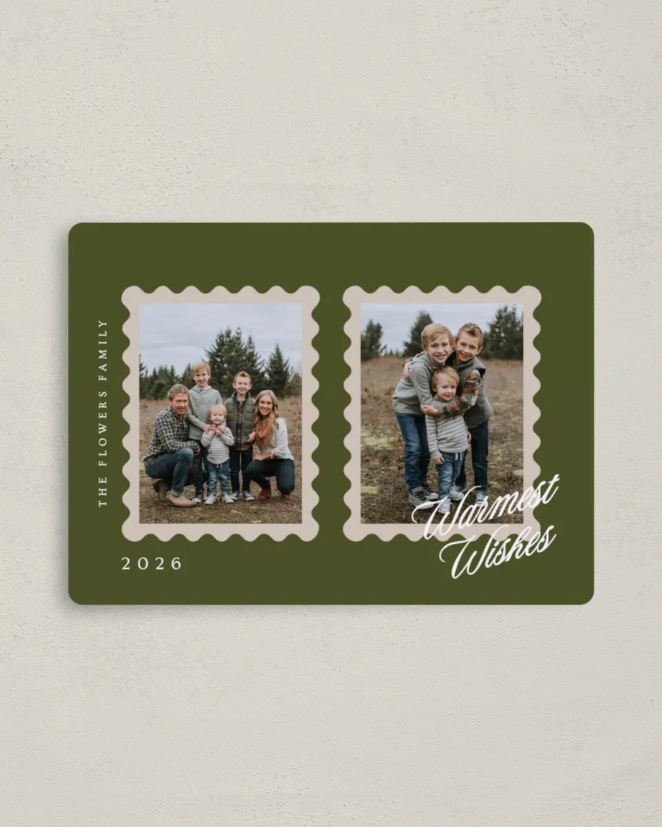 This is a 4" x 5½" Christmas Card called Holiday Stamps printed in full color with Silver foil and a Luxe Satin finish
