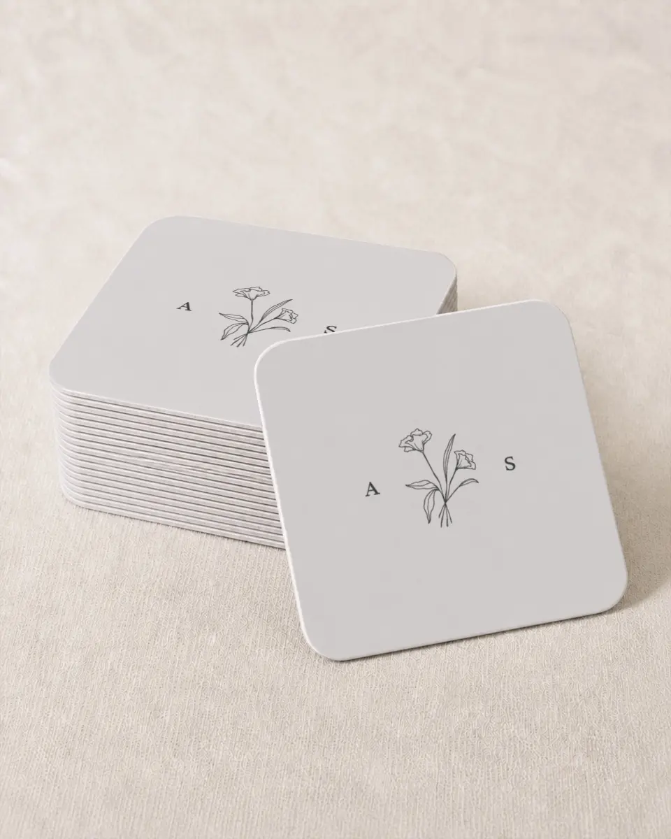 This is a 4" x 4" Wedding Coaster called Monogram Bloom printed in full color on Kraft Chipboard paper