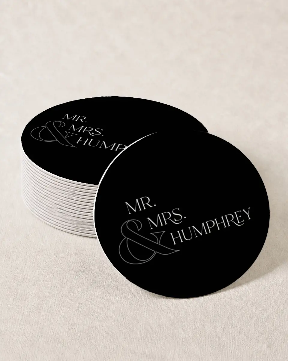 This is a 4" x 4" Wedding Coaster called The Lucy printed in full color with Gold foil on Kraft Chipboard paper