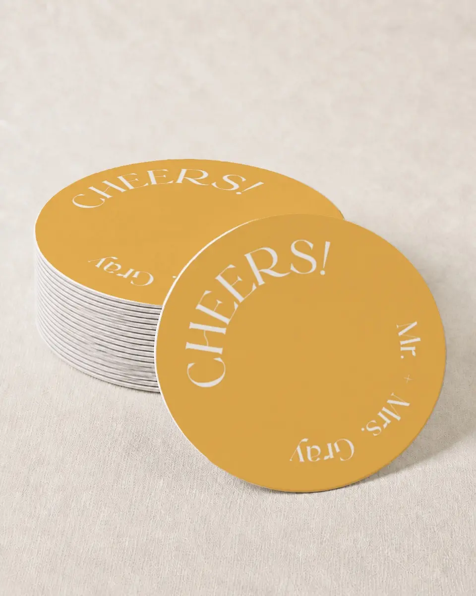 This is a 4" x 4" Wedding Coaster called The Leah printed in full color with Gold foil on Kraft Chipboard paper