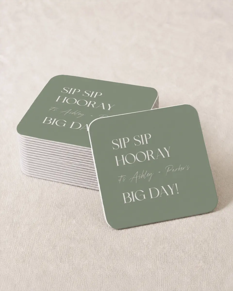 This is a 4" x 4" Wedding Coaster called Big Day printed in full color with Rose Gold foil on Kraft Chipboard paper