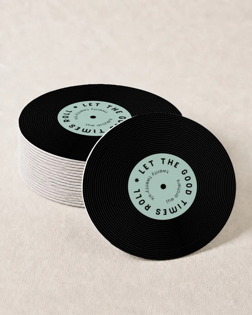 This is a 4" x 4" Wedding Coaster called Good Times Roll printed in full color with Gold foil on Kraft Chipboard paper