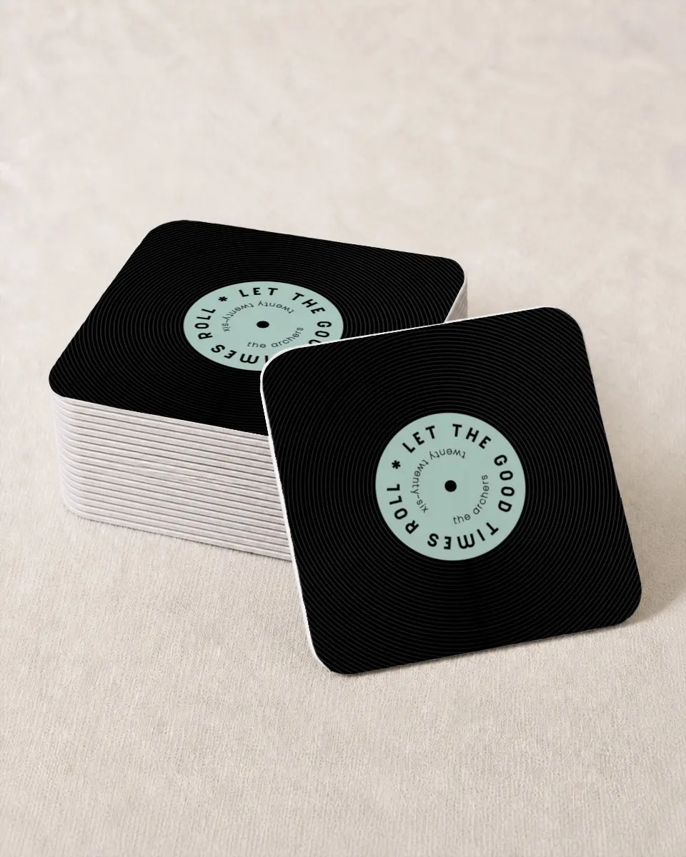 This is a 4" x 4" Wedding Coaster called Good Times Roll printed in full color with Rose Gold foil on Kraft Chipboard paper