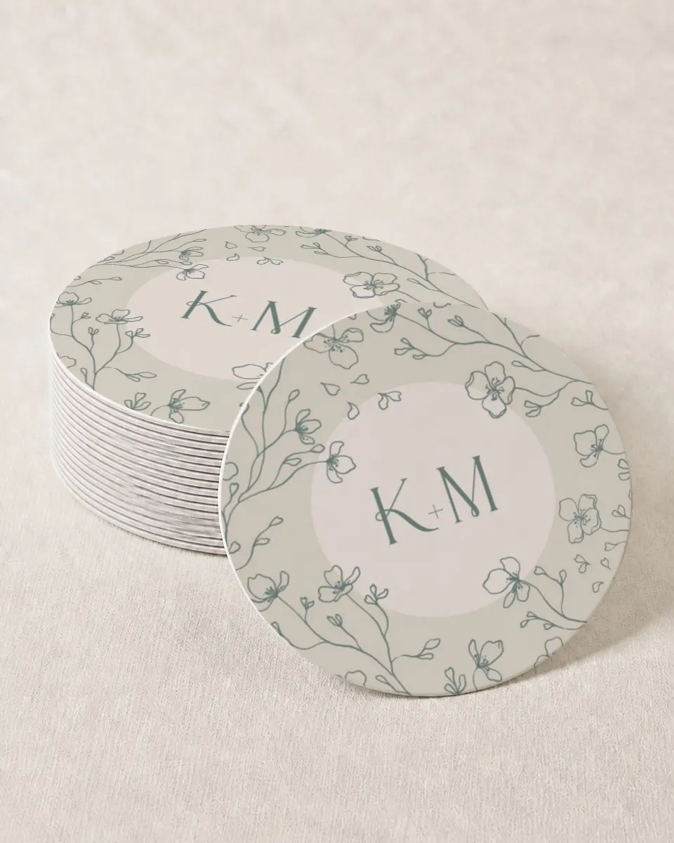 This is a 4" x 4" Wedding Coaster called Married Monogram printed in full color with Gold foil on Kraft Chipboard paper