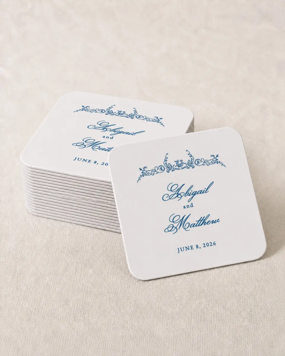 This is a 4" x 4" Wedding Coaster called Ornamental Elegance printed in full color with Gold foil on Kraft Chipboard paper
