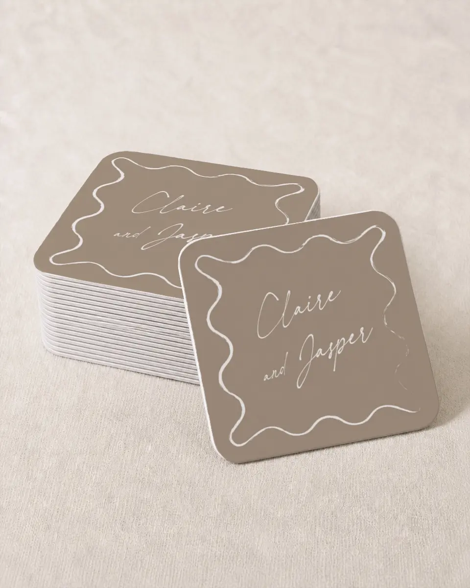 This is a 4" x 4" Wedding Coaster called Romantic Sketch printed in full color with Gold foil on Kraft Chipboard paper