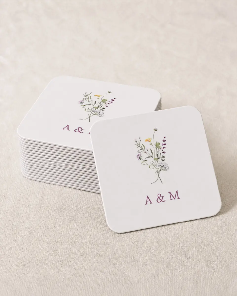 This is a 4" x 4" Wedding Coaster called Whimsy Fairytale printed in full color with Gold foil on Kraft Chipboard paper