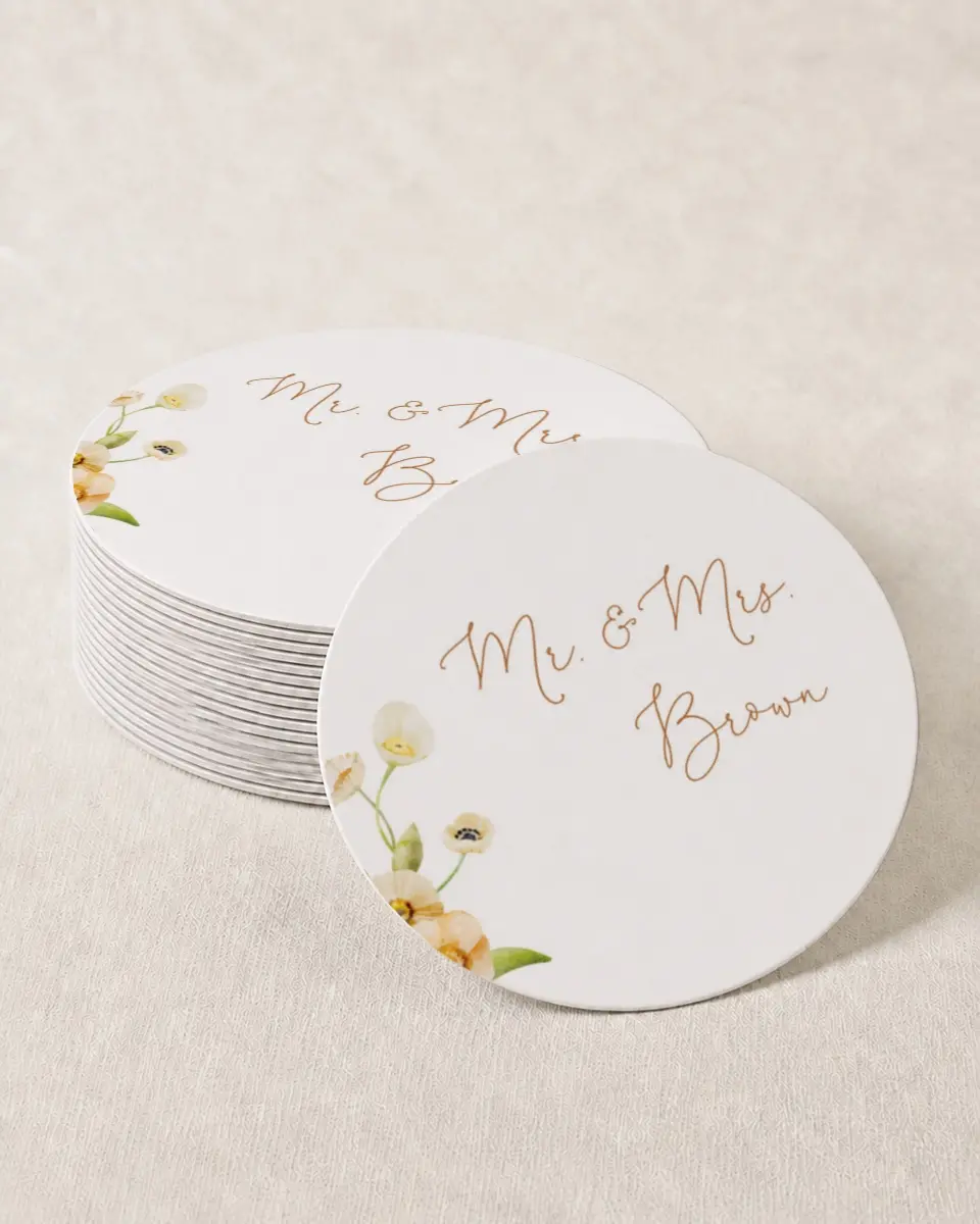 This is a 4" x 4" Wedding Coaster called Sultry Sunshine printed in full color with Gold foil on Kraft Chipboard paper