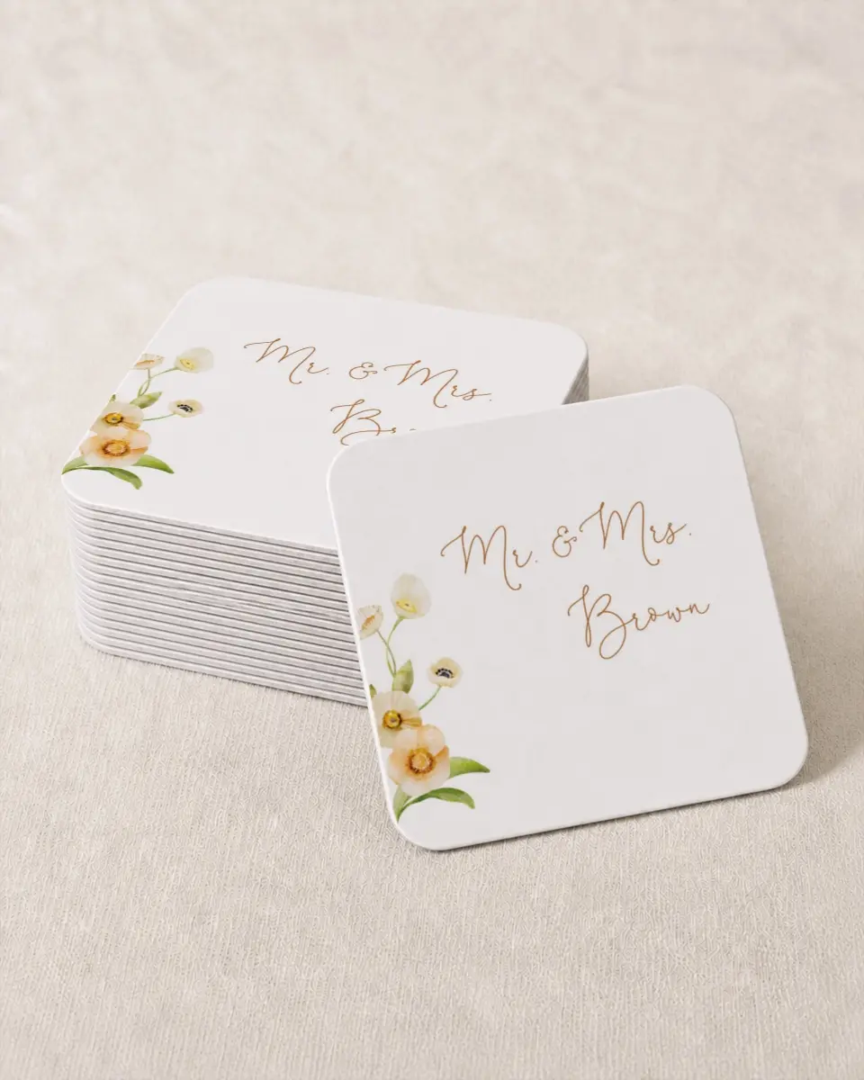 This is a 4" x 4" Wedding Coaster called Sultry Sunshine printed in full color with Gold foil on Kraft Chipboard paper