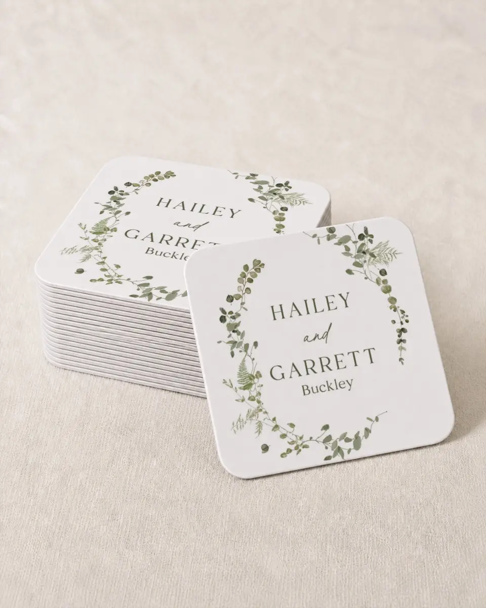This is a 4" x 4" Wedding Coaster called The Hailey printed in full color with Gold foil on Kraft Chipboard paper