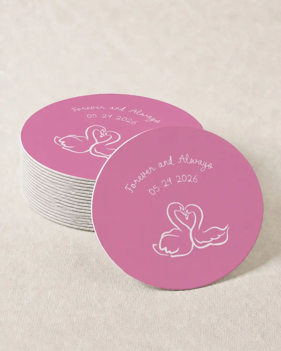 This is a 4" x 4" Wedding Coaster called Swan Love printed in full color with Gold foil on Kraft Chipboard paper