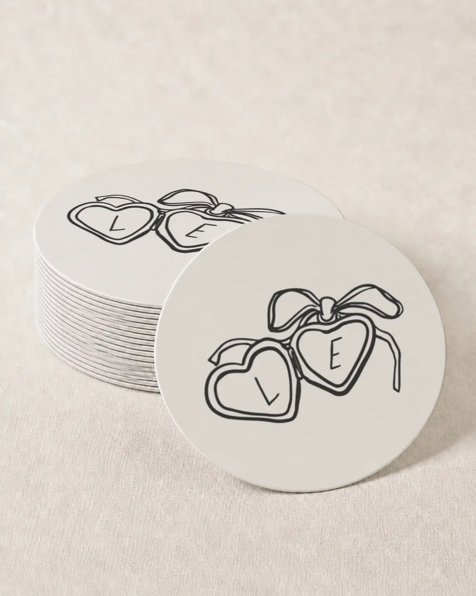 This is a 4" x 4" Wedding Coaster called Locket of Love printed in full color with Gold foil on Kraft Chipboard paper