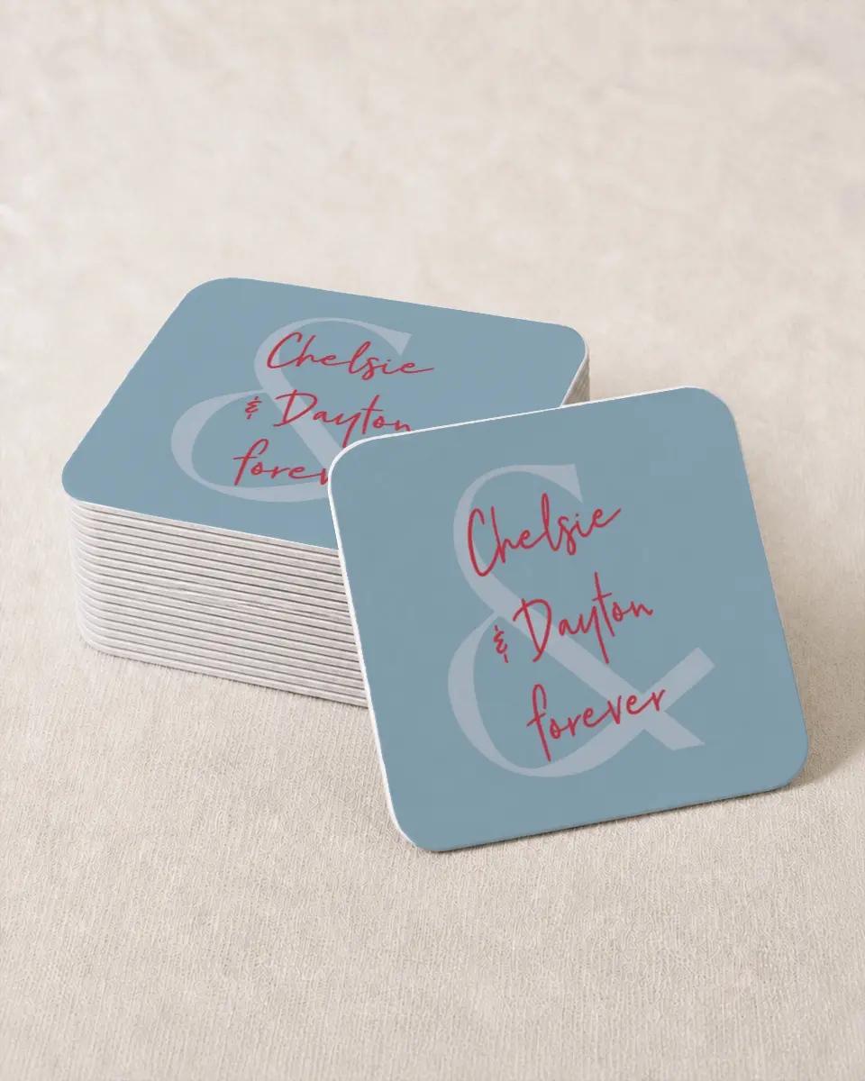 This is a 4" x 4" Wedding Coaster called Lovey-Dovey printed in full color with Gold foil on Kraft Chipboard paper