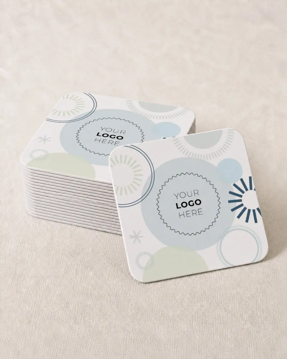 This is a 4" x 4" Wedding Coaster called Popular Spot printed in full color with Silver foil on Kraft Chipboard paper