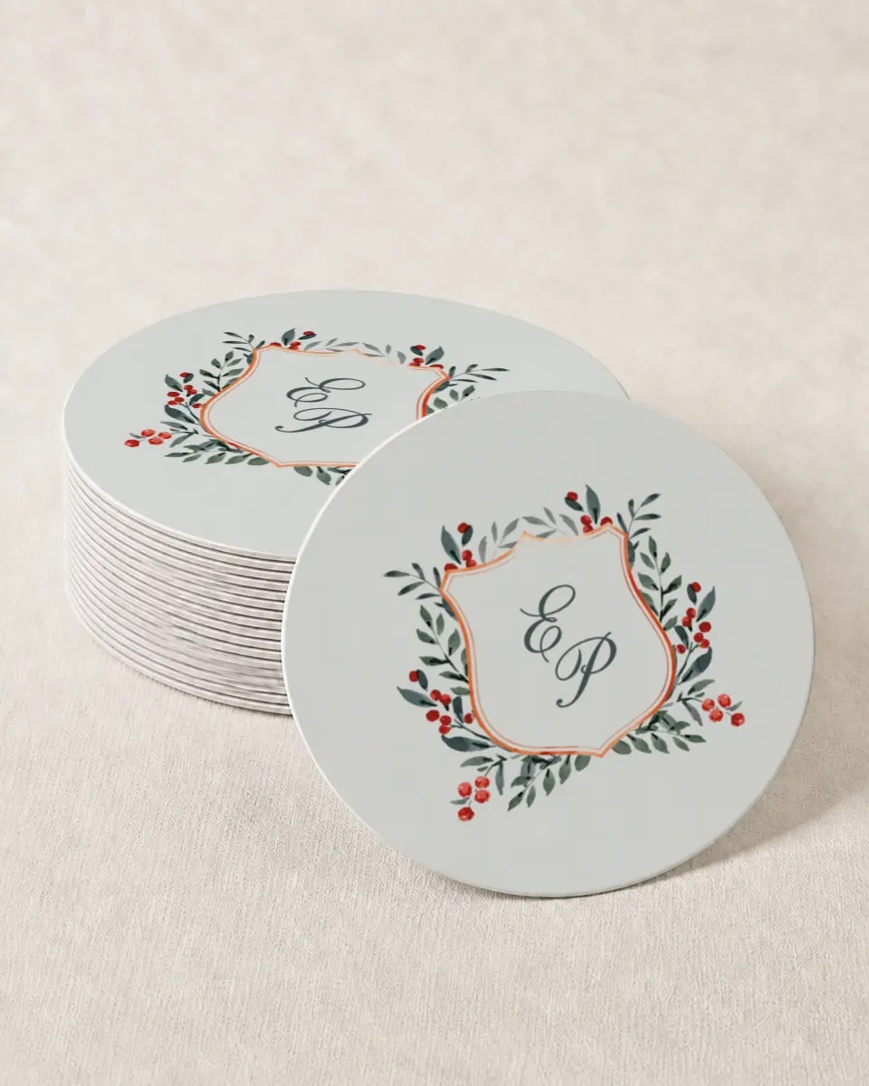 This is a 4" x 4" Wedding Coaster called Heirloom Holly printed in full color with Gold foil on Kraft Chipboard paper