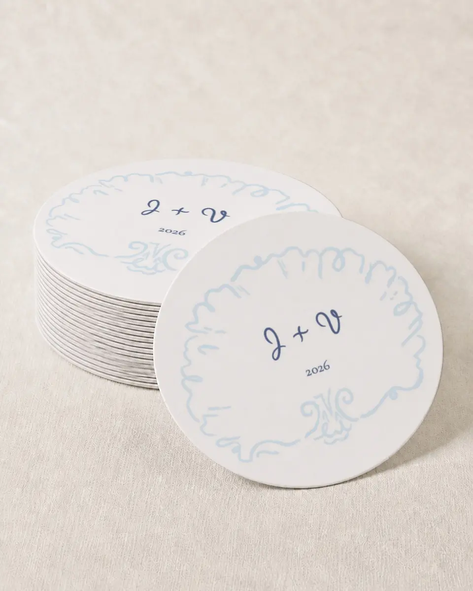 This is a 4" x 4" Wedding Coaster called Love by the Sea printed in full color with Gold foil on Kraft Chipboard paper