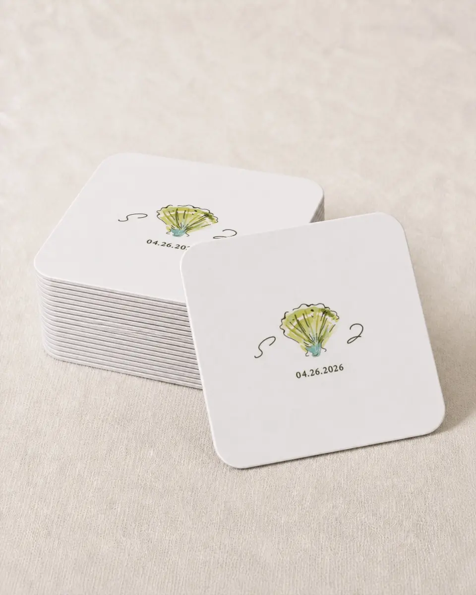 This is a 4" x 4" Wedding Coaster called Whimsical Shells printed in full color on Kraft Chipboard paper