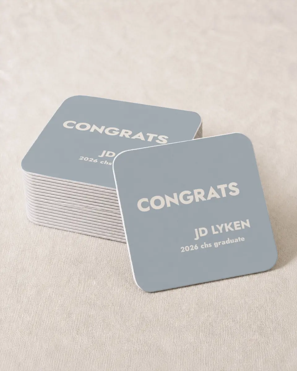 This is a 4" x 4" Wedding Coaster called Changing Chapters printed in full color on Kraft Chipboard paper