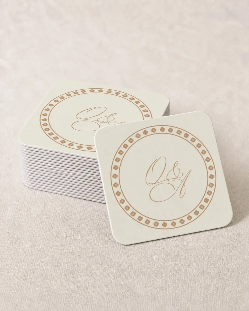 This is a 4" x 4" Wedding Coaster called Beaded Veil printed in full color with Gold foil on Kraft Chipboard paper