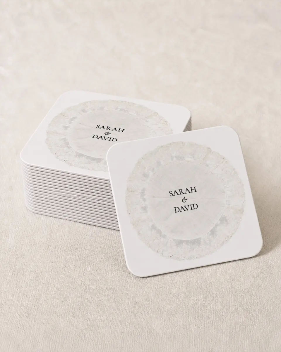 This is a 4" x 4" Wedding Coaster called Trimmed Lace printed in full color with Gold foil on Kraft Chipboard paper