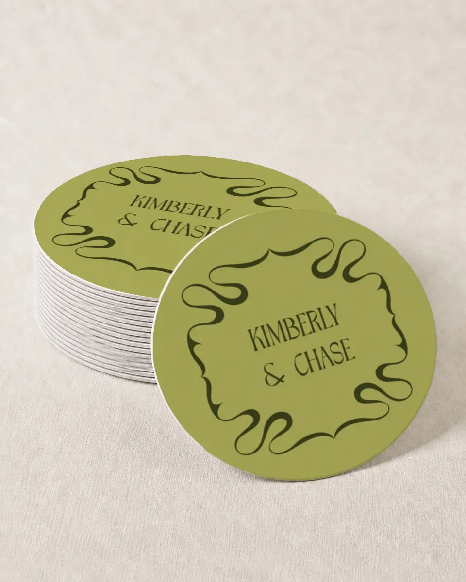 This is a 4" x 4" Wedding Coaster called Nouveau Romance printed in full color with Gold foil on Kraft Chipboard paper
