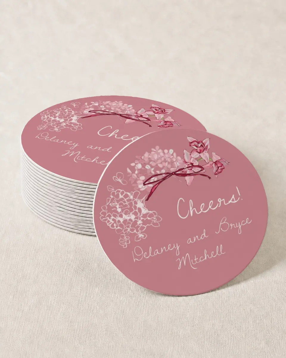 This is a 4" x 4" Wedding Coaster called Blushing Whimsy printed in full color with Gold foil on Kraft Chipboard paper