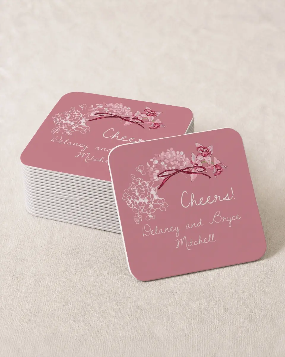 This is a 4" x 4" Wedding Coaster called Blushing Whimsy printed in full color with Gold foil on Kraft Chipboard paper