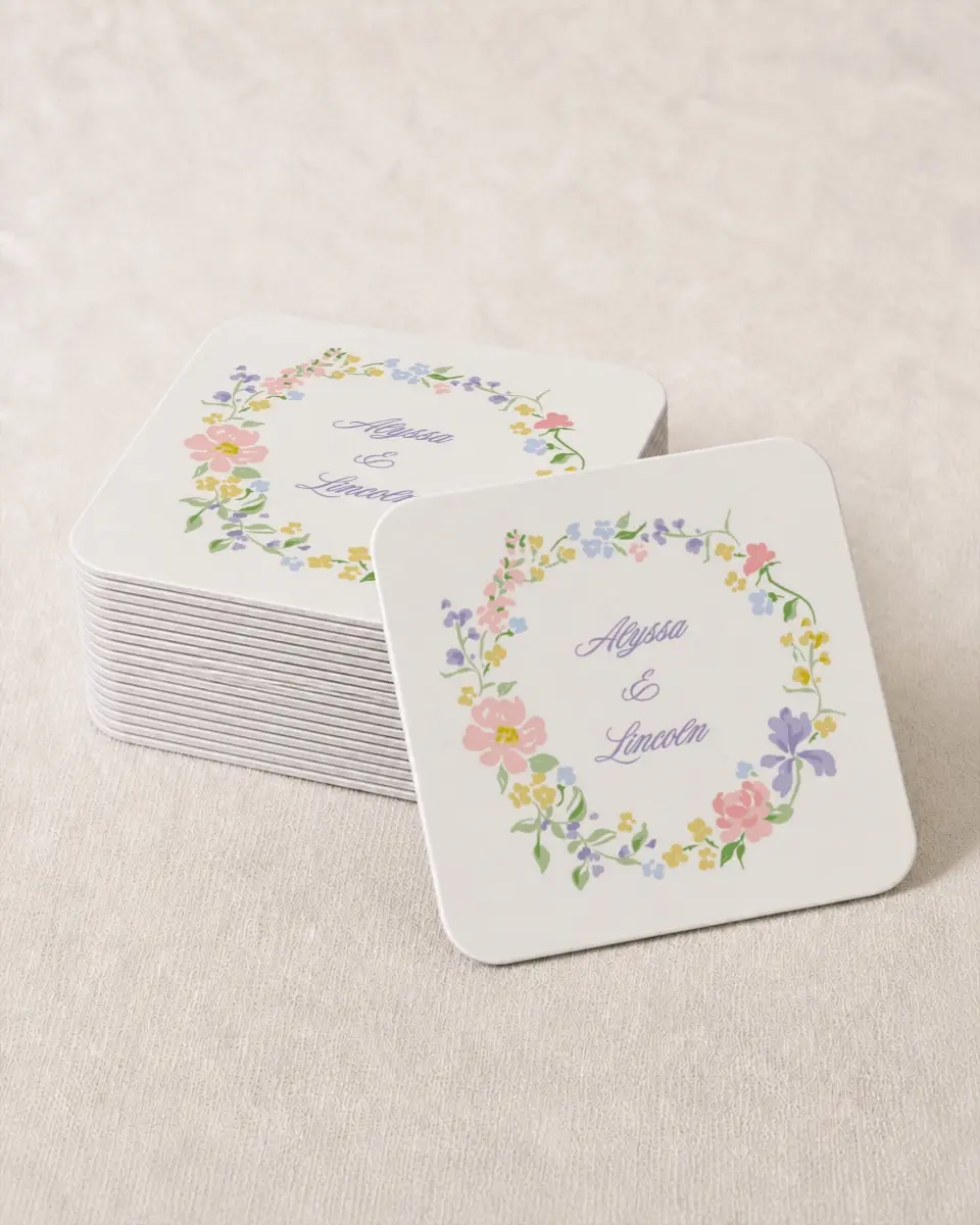 This is a 4" x 4" Wedding Coaster called Gentle Garden printed in full color with Gold foil on Kraft Chipboard paper