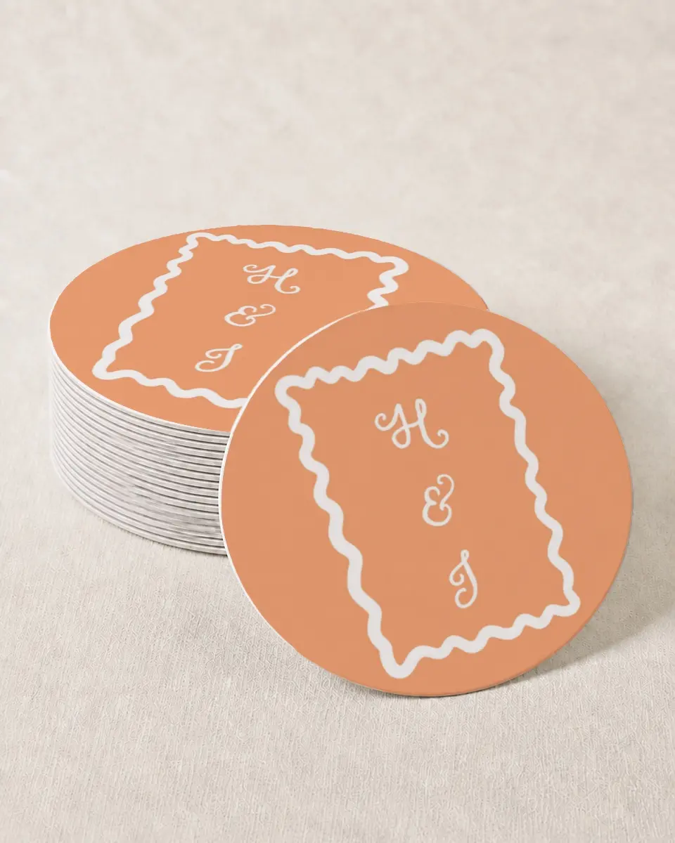 This is a 4" x 4" Wedding Coaster called Wavy Love printed in full color with Gold foil on Kraft Chipboard paper