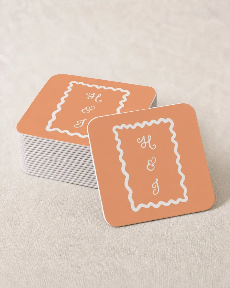 This is a 4" x 4" Wedding Coaster called Wavy Love printed in full color with Gold foil on Kraft Chipboard paper