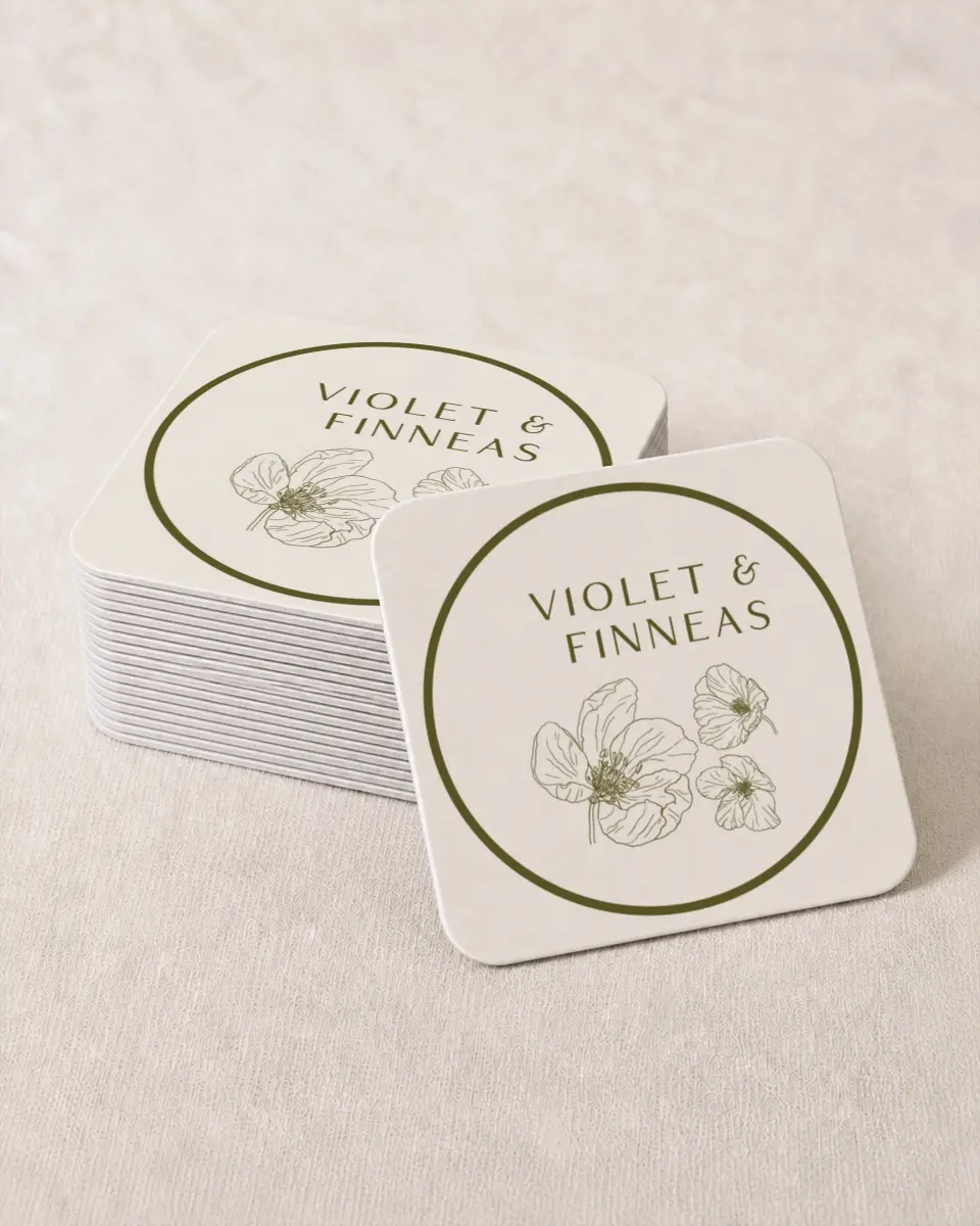 This is a 4" x 4" Wedding Coaster called Delicate Love printed in full color with Gold foil on Kraft Chipboard paper