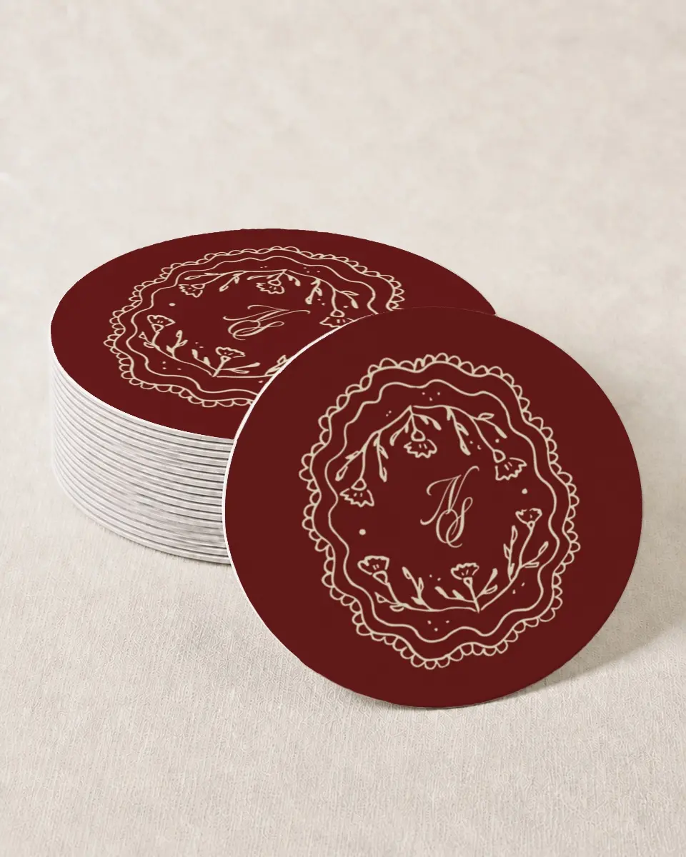 This is a 4" x 4" Wedding Coaster called Bloom & Crest printed in full color with Gold foil on Kraft Chipboard paper