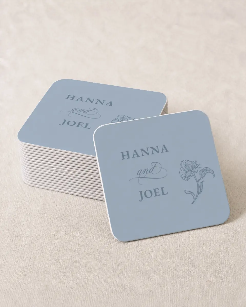 This is a 4" x 4" Wedding Coaster called Pressed Petals printed in full color with Gold foil on Kraft Chipboard paper