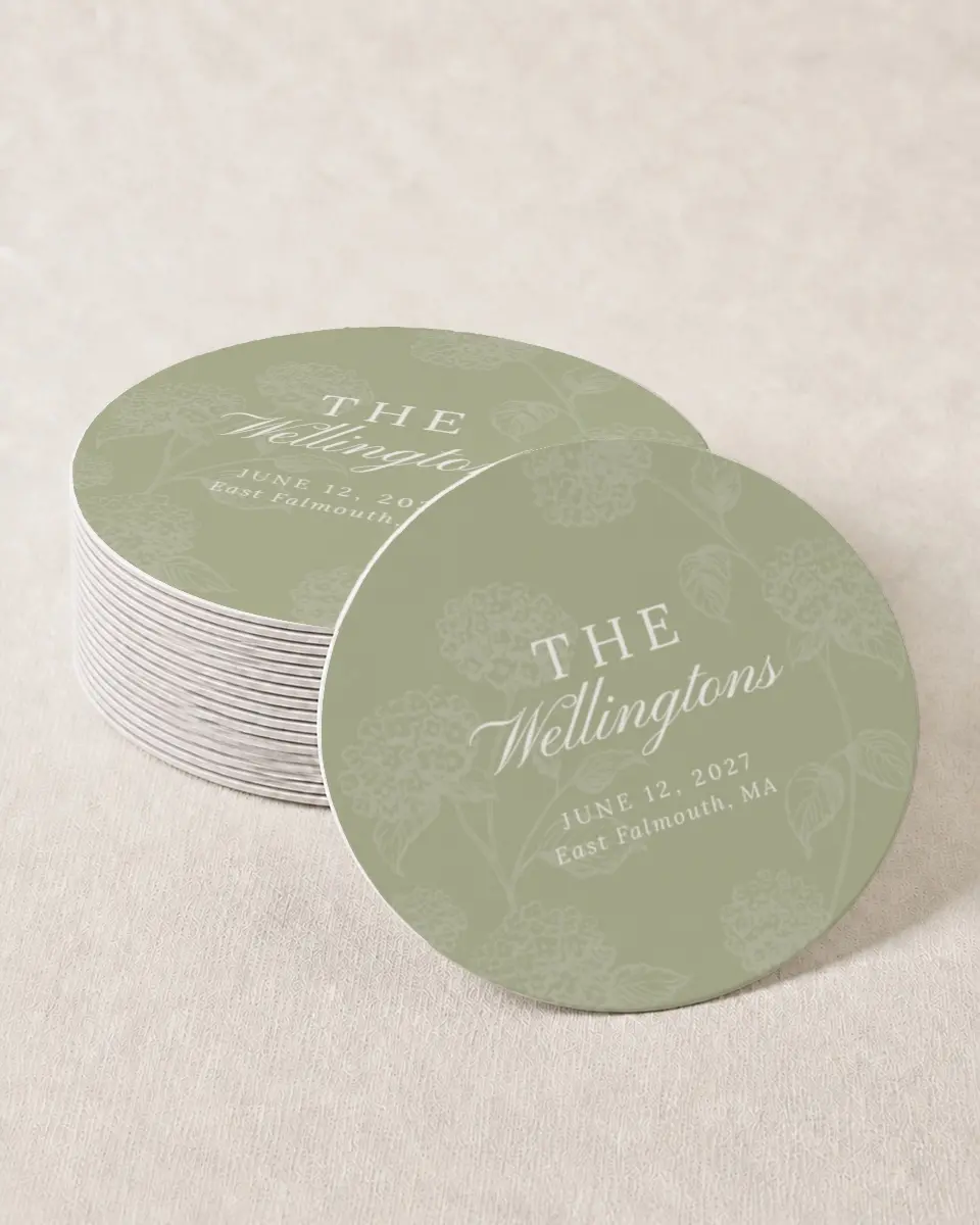 This is a 4" x 4" Wedding Coaster called Harmonious Hydrangea printed in full color with Rose Gold foil on Kraft Chipboard paper