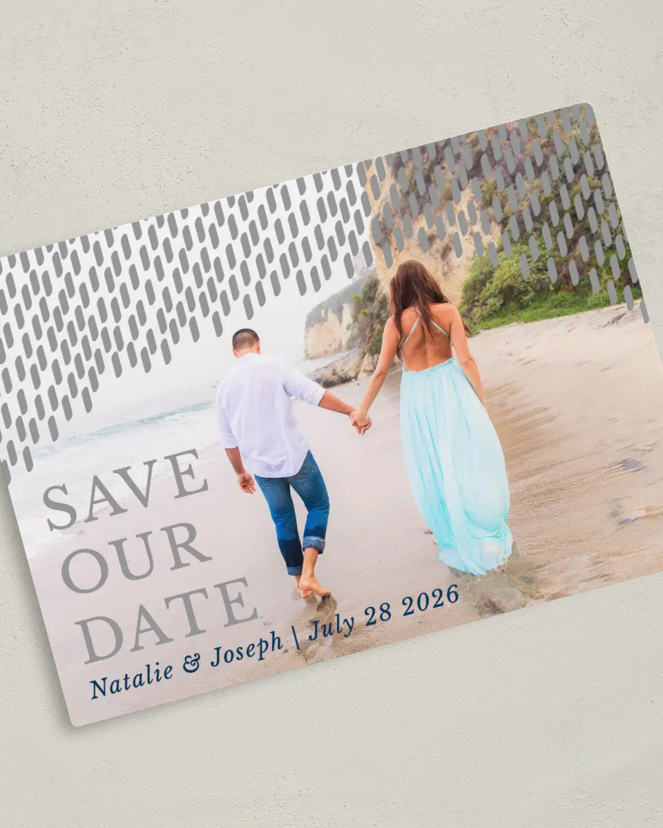 This is a 5" x 7" Save the Date Magnet called Modern Dash printed in full color with Silver foil and a Luxe Satin finish