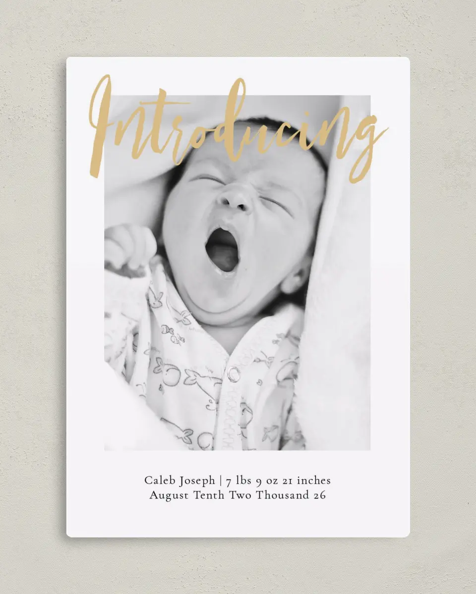 This is a 5" x 7" Birth Announcement Magnet called Glowing Intro printed in full color with a Luxe Satin finish