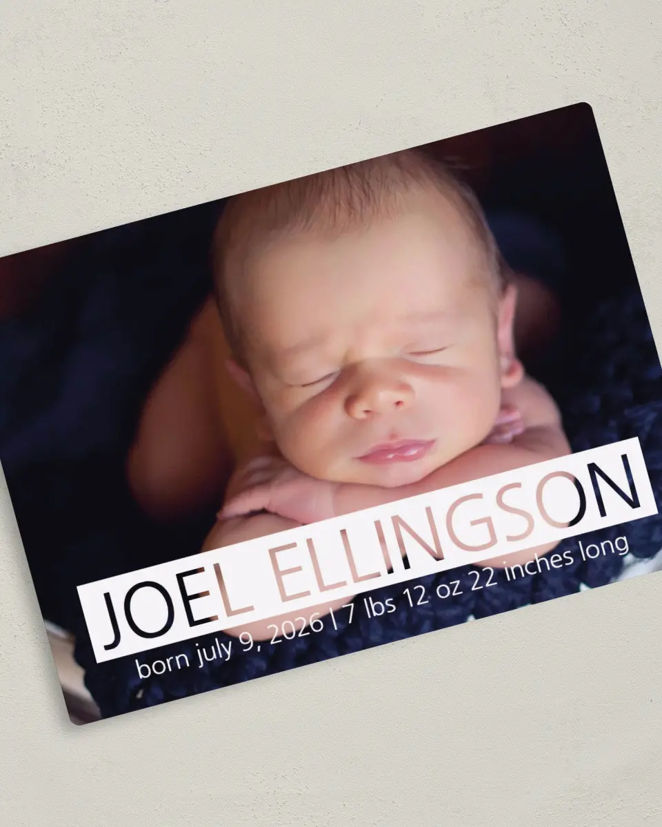 This is a 5" x 7" Birth Announcement Magnet called Pitter Patter Plaid printed in full color with a Luxe Satin finish