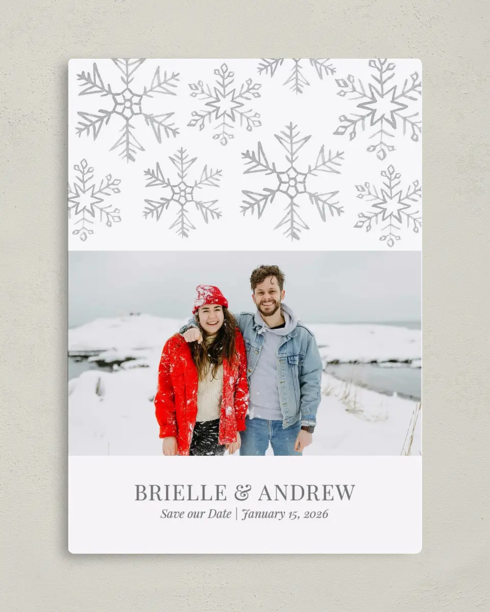 This is a 5" x 7" Save the Date Magnet called Sweet Snowflakes printed in full color with a Luxe Satin finish