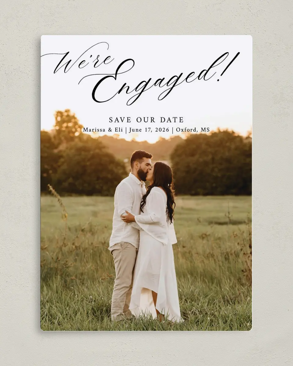 This is a 5" x 7" Save the Date Magnet called Elegant Engagement printed in full color with Silver foil and a Luxe Satin finish