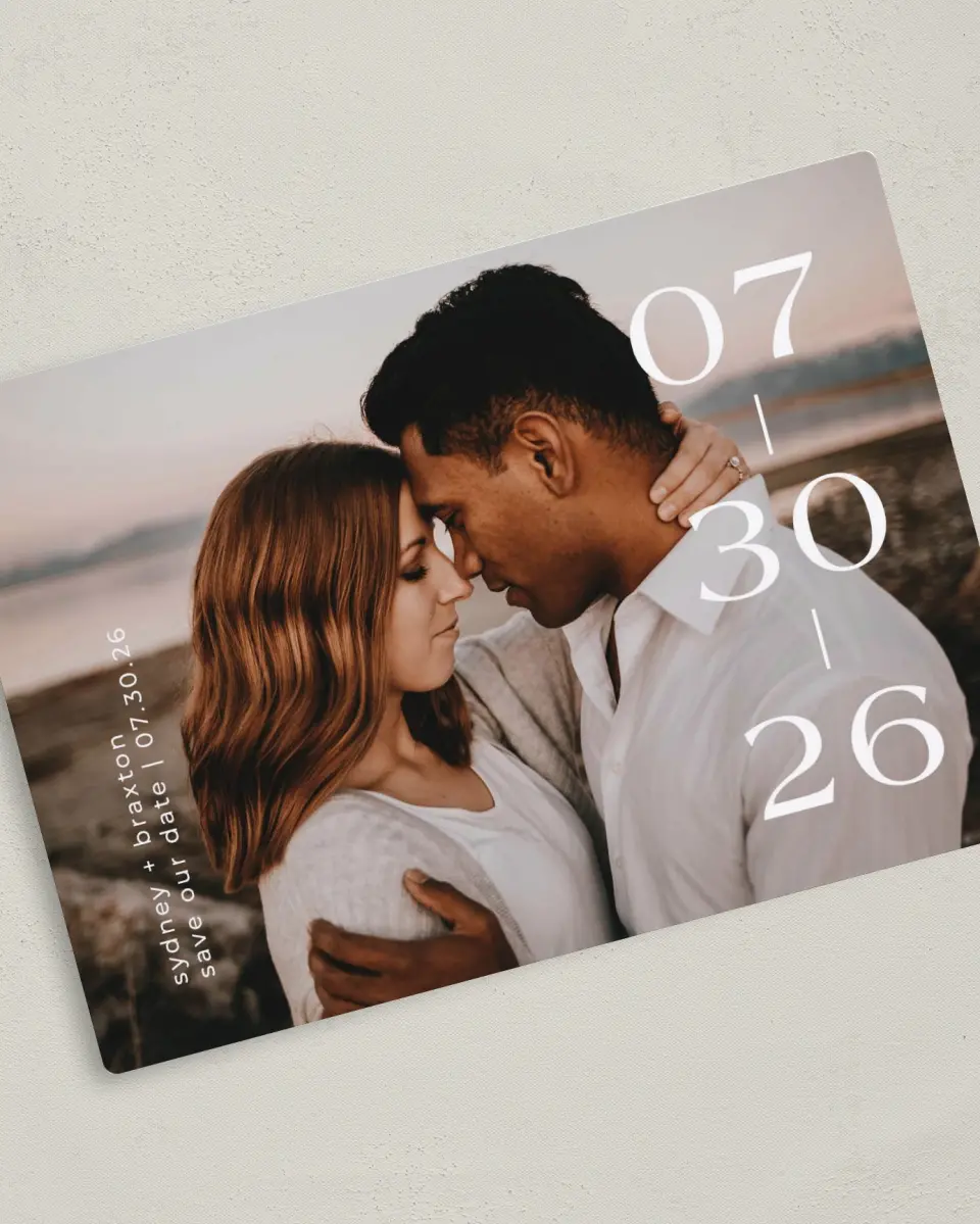 This is a 5" x 7" Save the Date Magnet called Daring Date printed in full color with a Luxe Satin finish