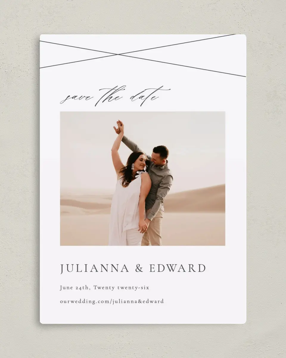 This is a 5" x 7" Save the Date Magnet called Distinct Lines printed in full color with Silver foil and a Luxe Satin finish