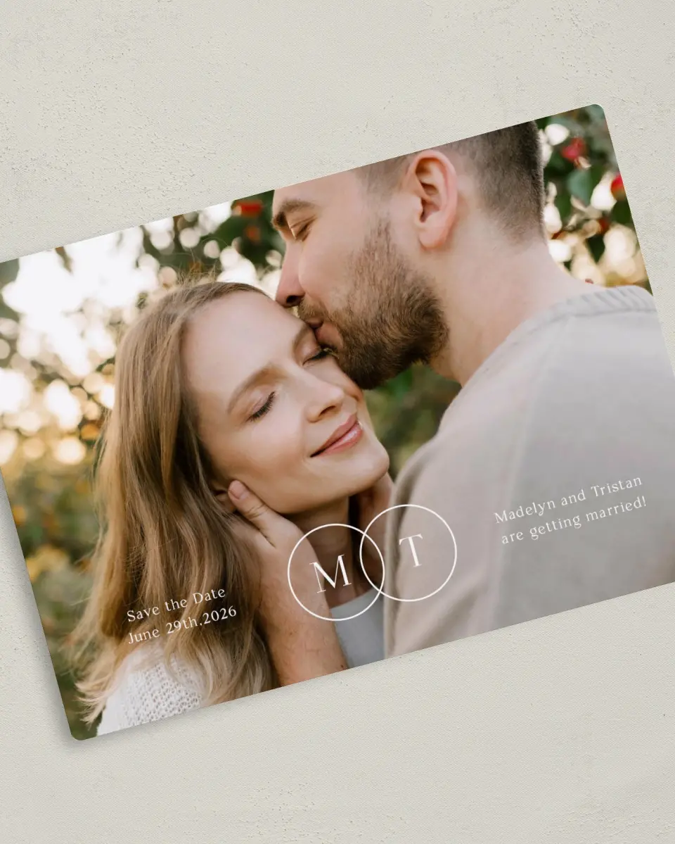 This is a 5" x 7" Save the Date Magnet called Bright Initials printed in full color with Silver foil and a Luxe Satin finish