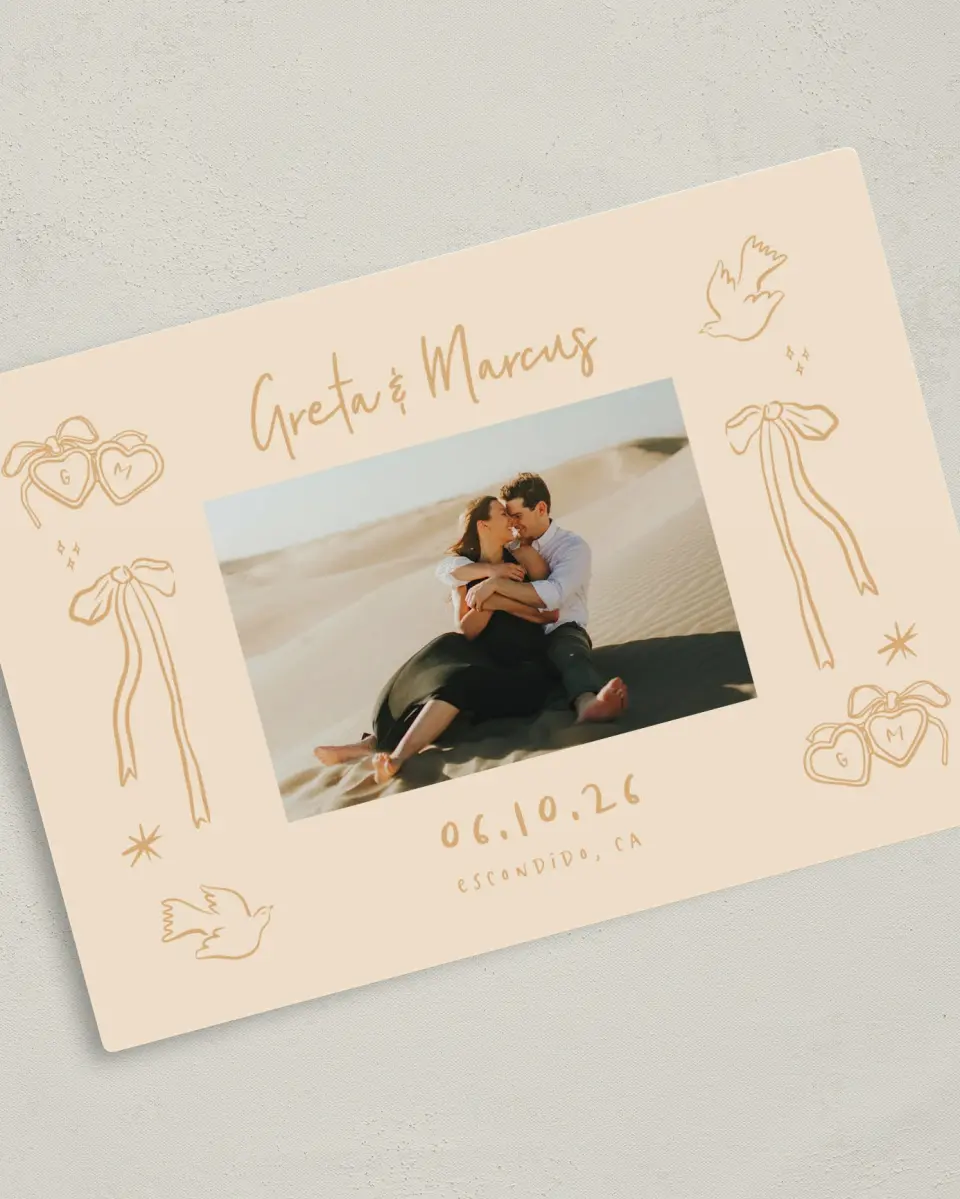 This is a 5" x 7" Save the Date Magnet called Loving Whimsy printed in full color with Gold foil and a Luxe Satin finish