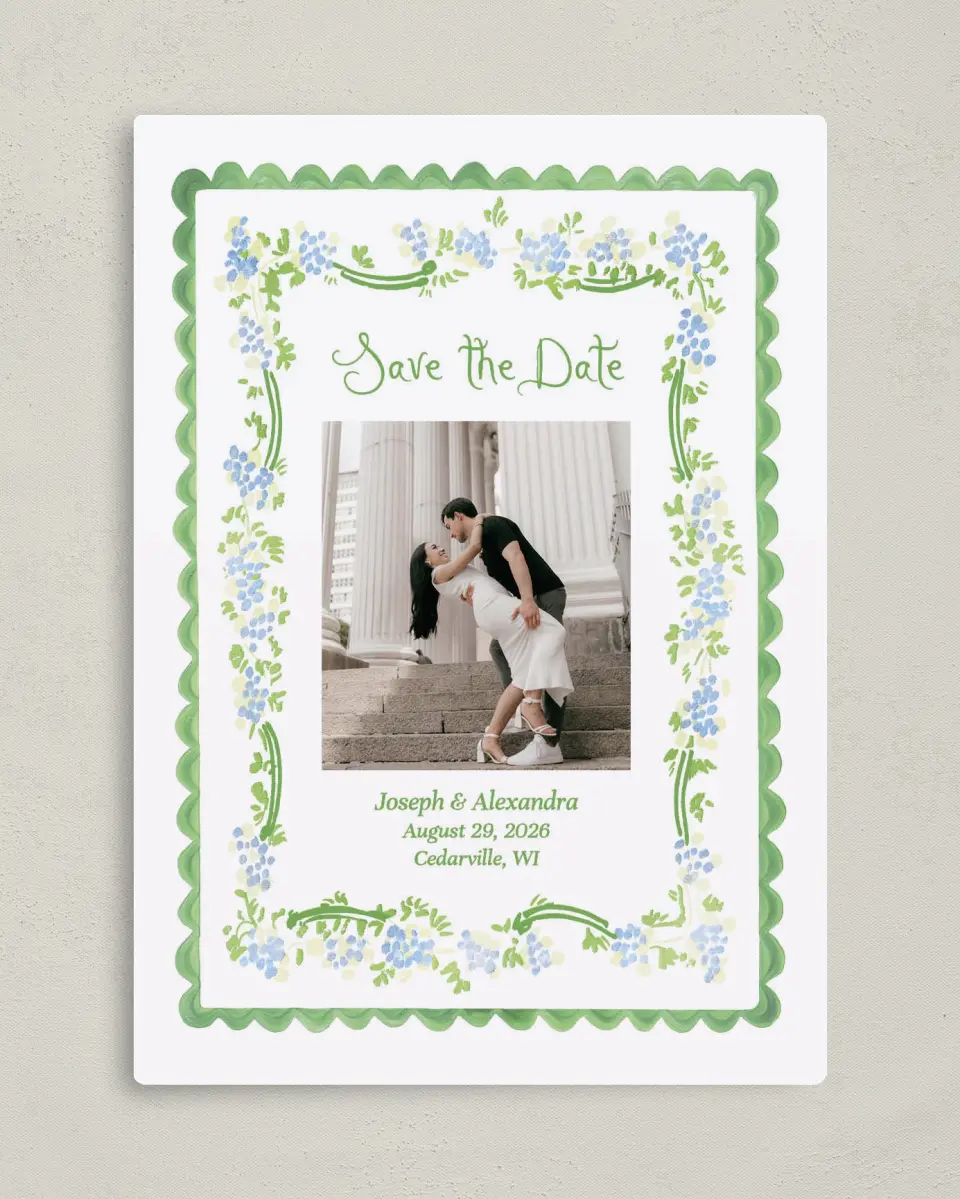This is a 5" x 7" Save the Date Magnet called Flower Frame printed in full color with Rose Gold foil and a Luxe Satin finish