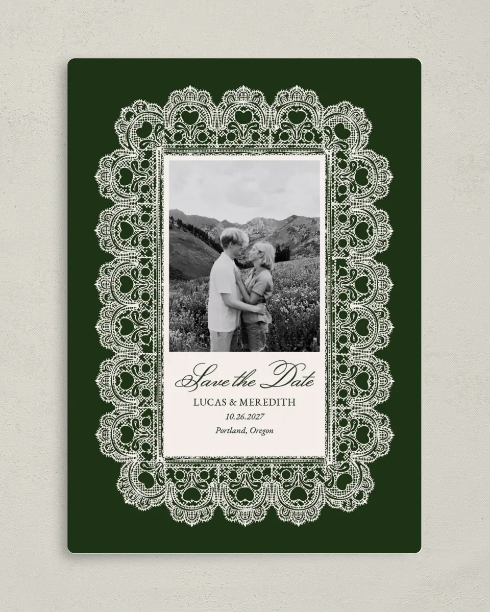 This is a 5" x 7" Save the Date Magnet called Lace Border printed in full color with a Luxe Satin finish