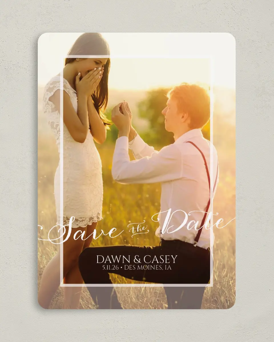 This is a 5" x 7" Save the Date Card called Heartfelt Frame printed in full color with Silver foil on Luxe Satin (coated) paper