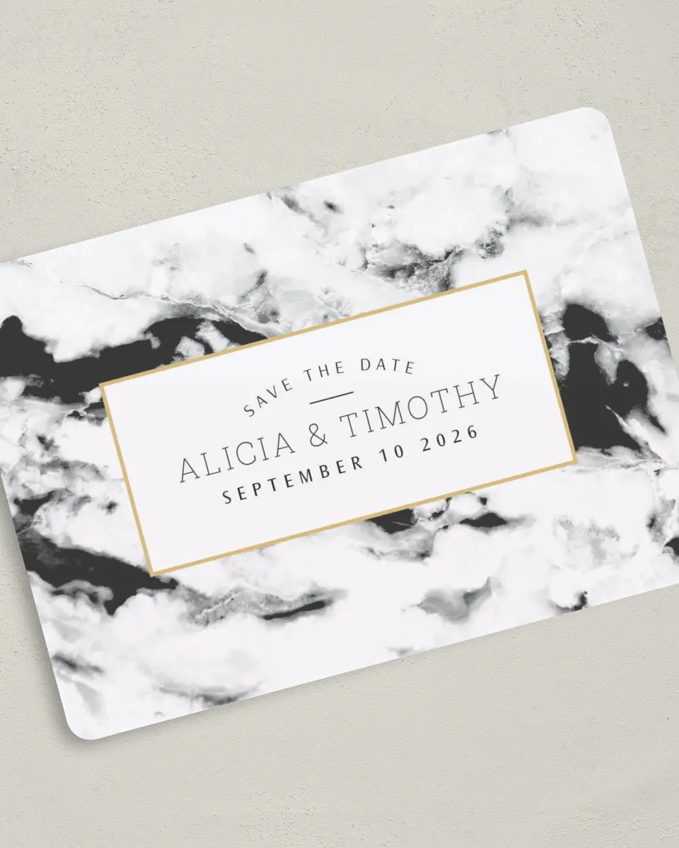 This is a 5" x 7" Save the Date Card called Love is Joy printed in full color with Silver foil on Luxe Satin (coated) paper