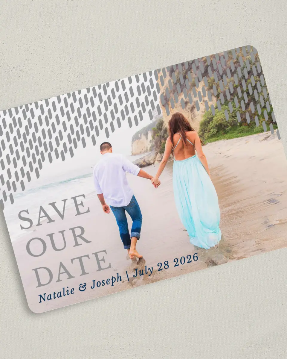 This is a 5" x 7" Save the Date Card called Modern Dash printed in full color with Silver foil on Luxe Satin (coated) paper
